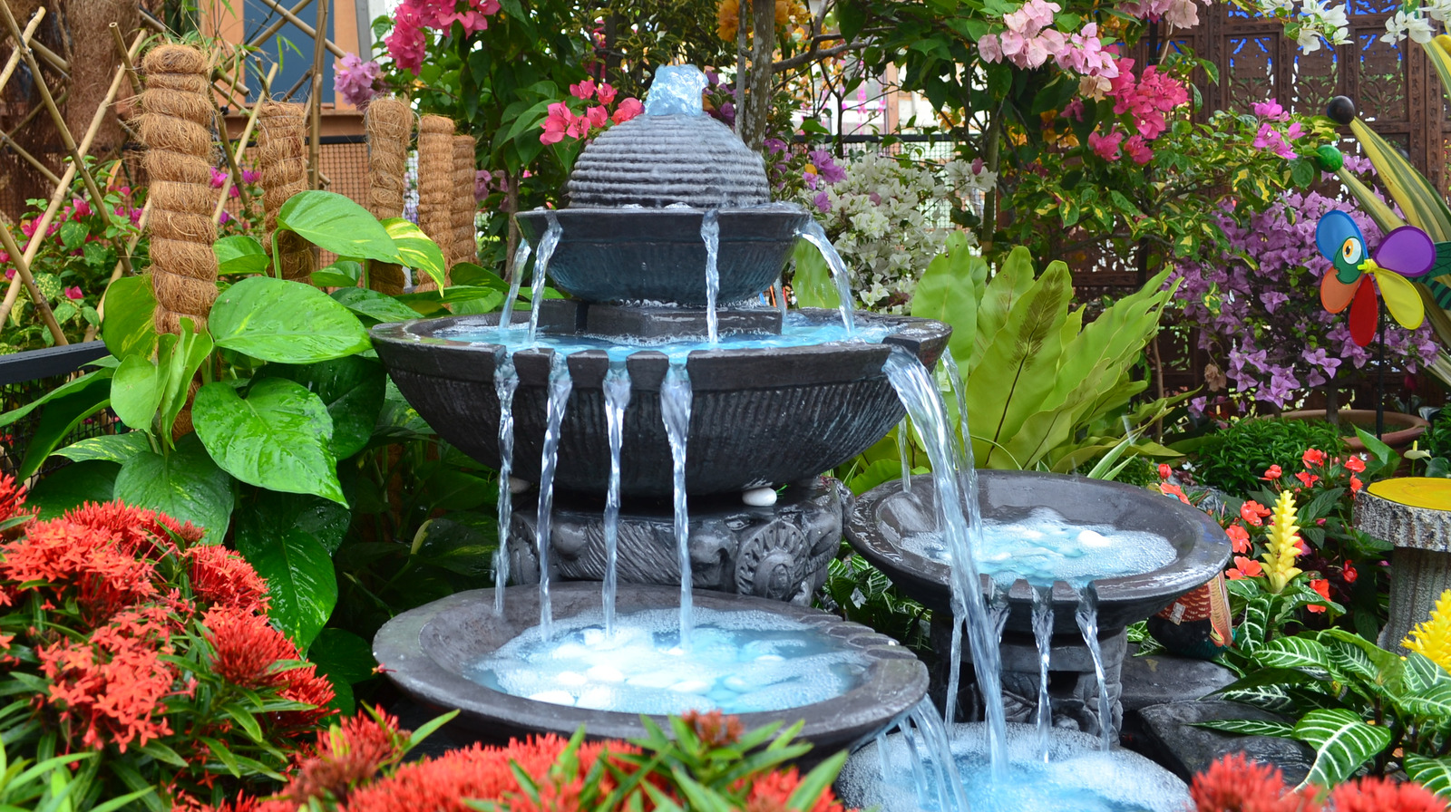 Antique,Fountain,At,Garden.,Blue,Water,Flowing,From,Stone,Fountain.